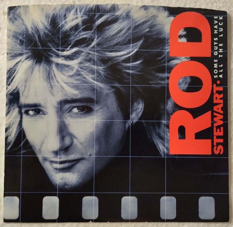 Lote siguiente: Rod Stewart - Álbum 'Some Guys Have All The Luck' de 1984