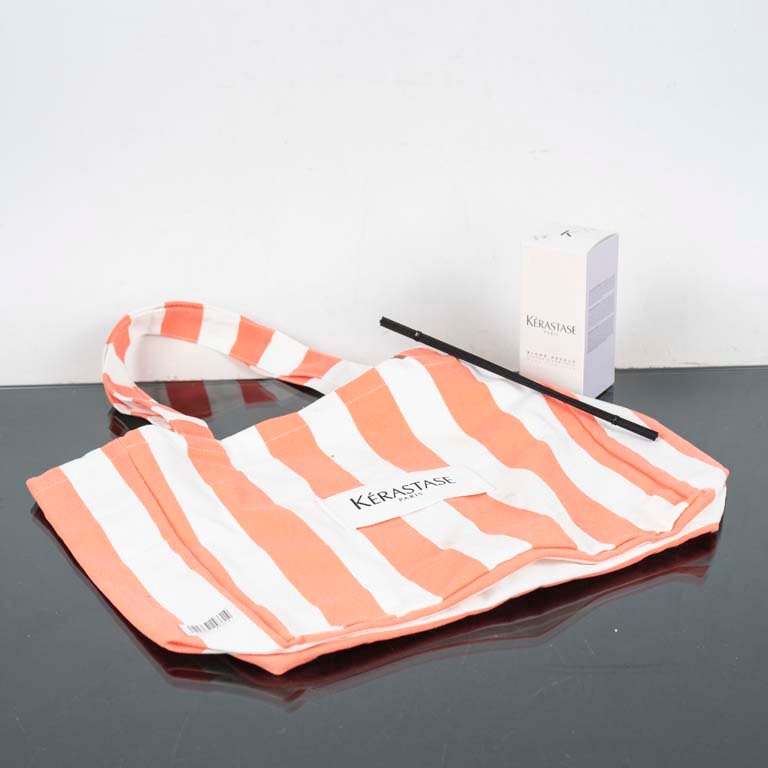 Lote anterior: Aromatizador y bolso de Kerastase