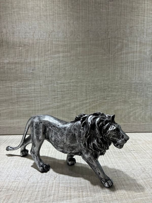 Escultura de león en metal - imagen 1