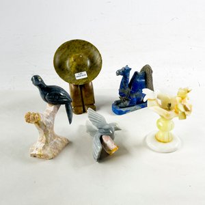 Lote de Cuatro Figuras Decorativas de Piedra Tallada - imagen 1