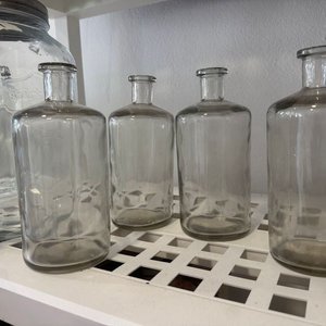 Lote siguiente: Lote de 4 Botellas de Vidrio Transparentes