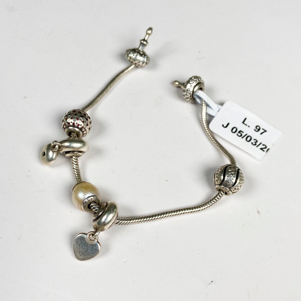 Lote anterior: Pulsera de plata PANDORA con cierre roto