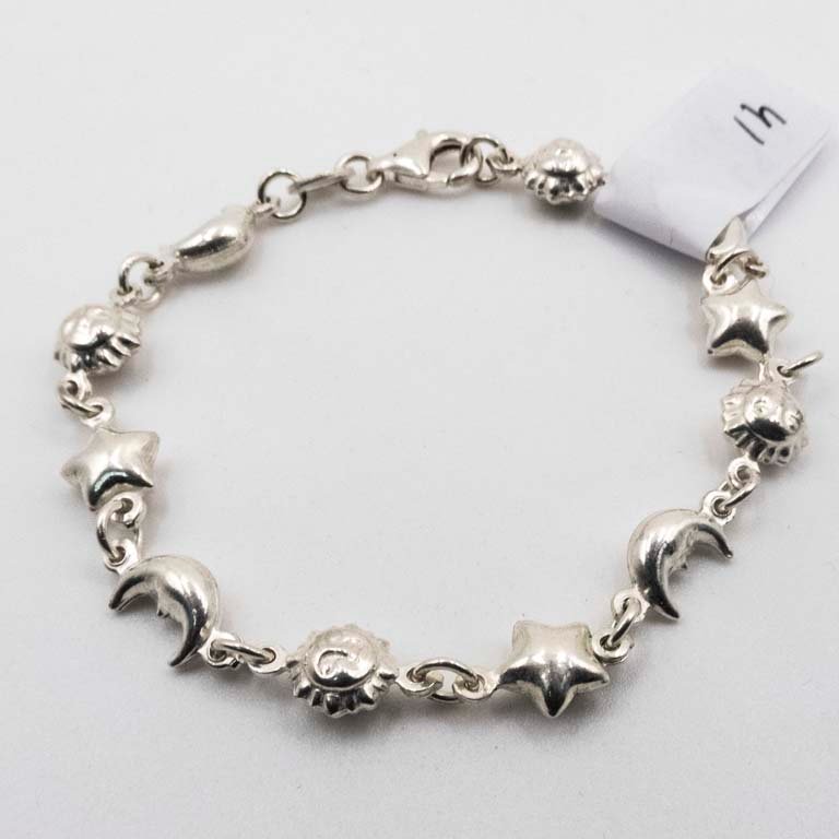 Pulsera de Plata con Dijes de Luna, Estrella y Sol