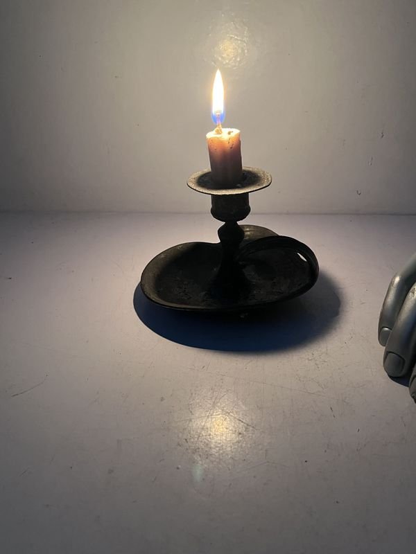 Candeleros de Peltre con Vela
