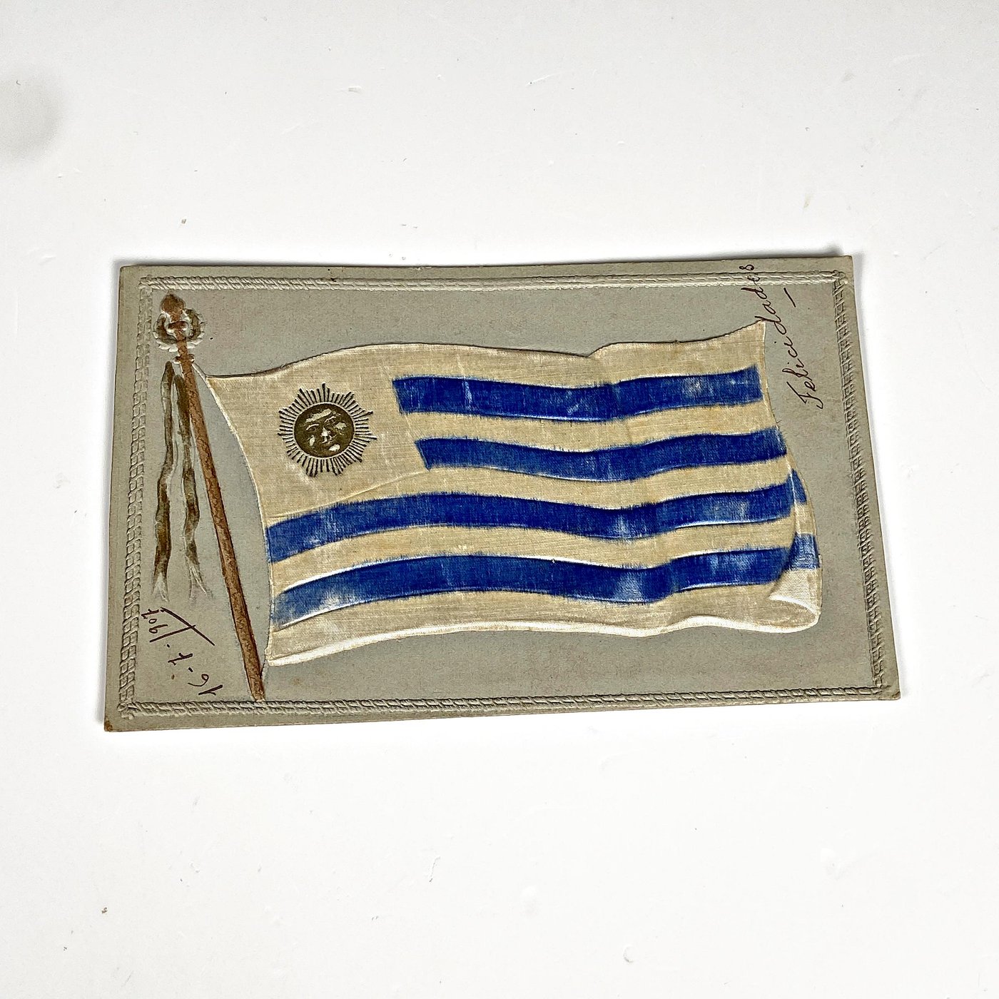 Postal antigua con bandera uruguaya 1907