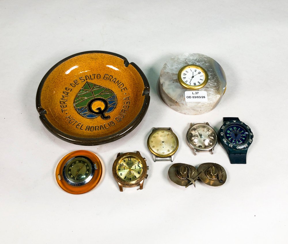 Lote anterior: Lotes de relojes y accesorios variados