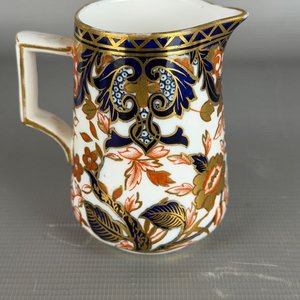 Lote siguiente: Jarra de Leche o Crema Royal Crown Derby Imari - Principios Siglo XIX