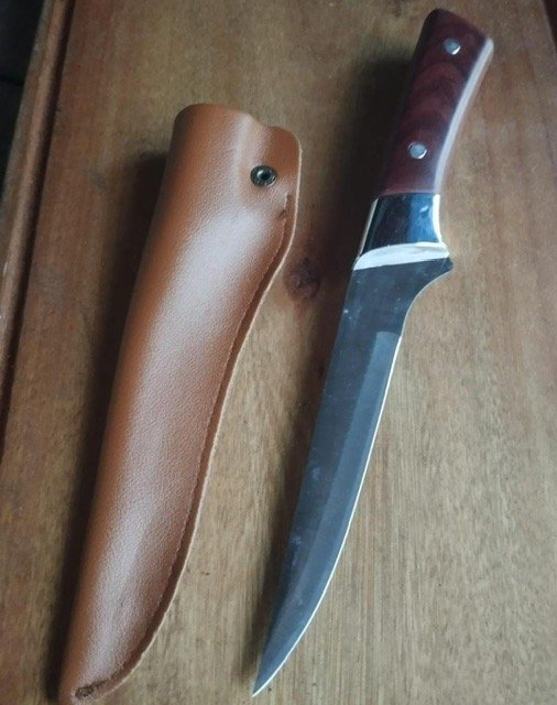 Lote siguiente: Cuchillo con hoja de acero inoxidable y manija de madera