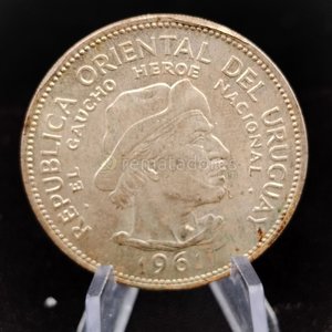 Lote siguiente: Moneda Conmemorativa "El Gaucho" República Oriental del Uruguay 1961