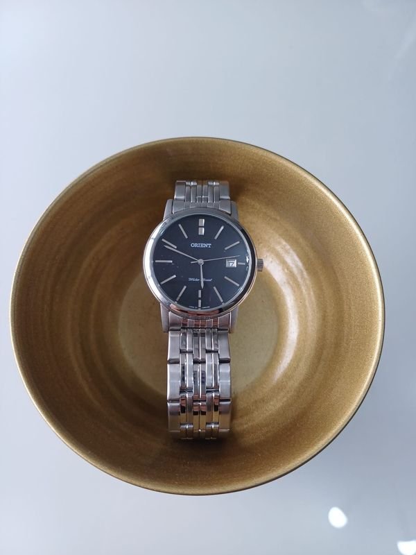 Reloj Orient de Acero Inoxidable con Esfera Negra y Ventana de Fecha