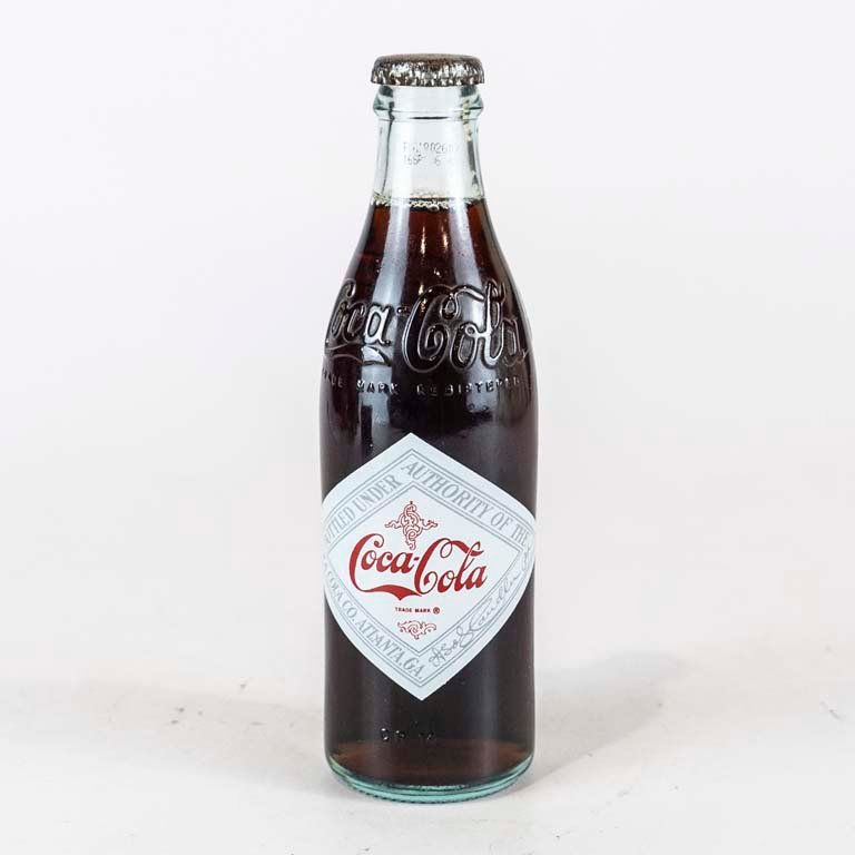 Lote anterior: Botella de Coca Cola antigua