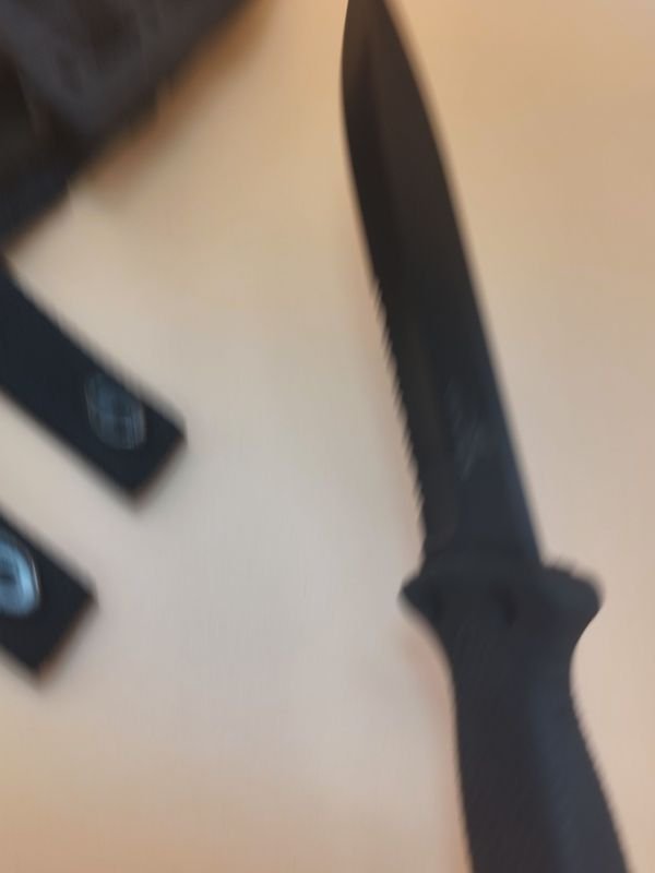 Cuchillo táctico Gerber con funda rígida y sistema de fijación - imagen 7