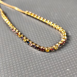 Cadena con Dije Artesanal en Plata y Pulsera Dorada con Piedras Sintéticas - imagen 7