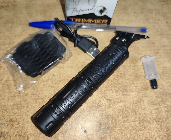 Cortapelos recargables con accesorios, nueva en caja - imagen 4