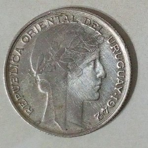 Lote anterior: Moneda Uruguaya de Plata 20 Centésimos 1942 - Efigie de la República