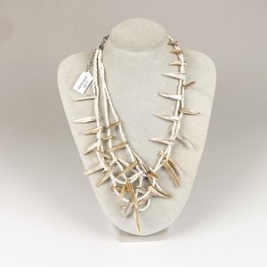 Lote anterior: Collar Doble de Perlas de Río y Dientes de Animal