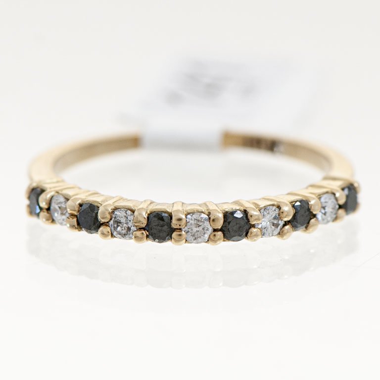 Lote siguiente: Pulsera de Oro 18k con Diamantes Blancos y Negros