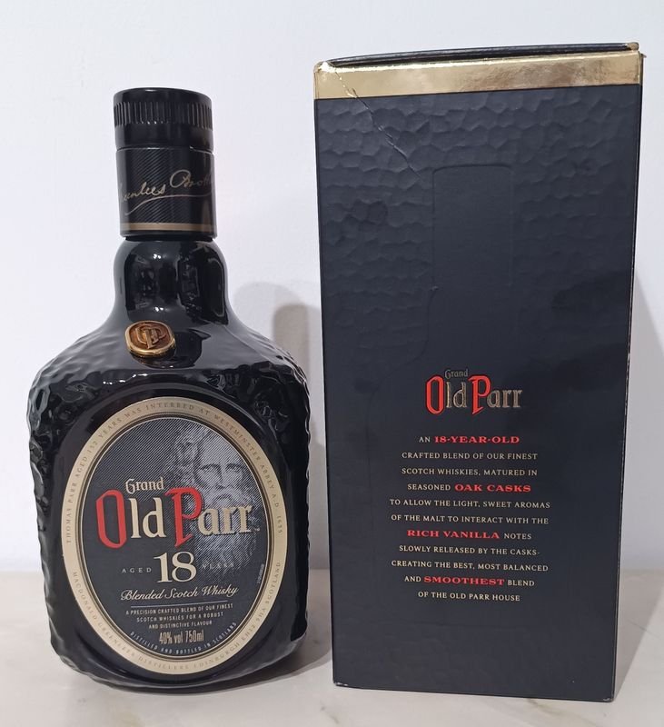Lote anterior: Botella de Whisky OLD PARR 18 Aged