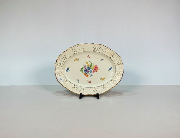Lote anterior: Fuente oval en losa americana decorada con flores