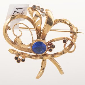 Lote siguiente: Prendedor de Oro 18k con Piedra Azul y Circones