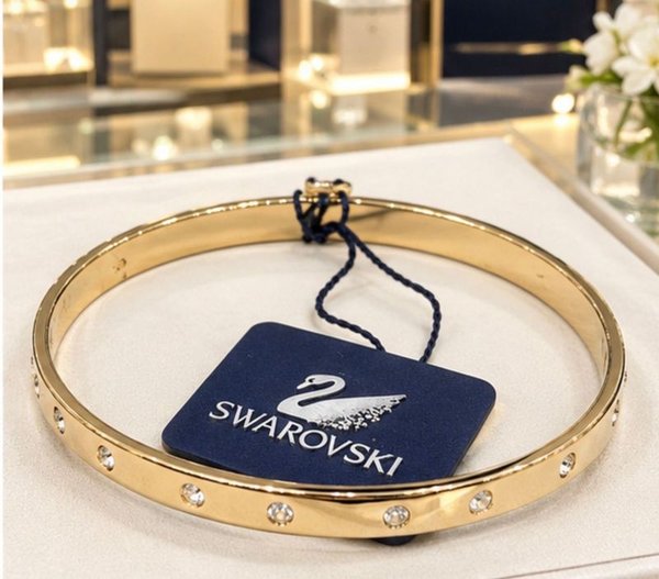 Pulsera Rígida Swarovski Dorada con Cristales Transparentes - imagen 1