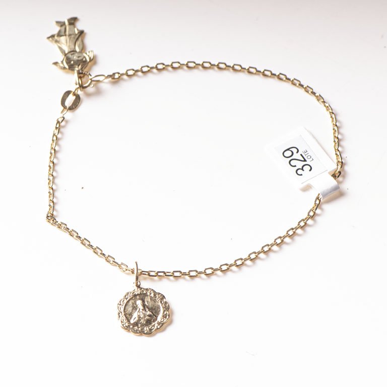 Lote anterior: Pulsera de oro 18k con dijes