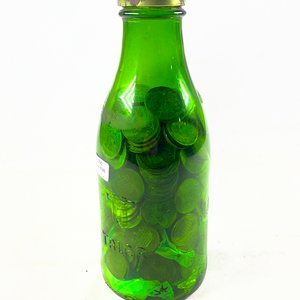 Lote anterior: Botella Verde Llena de Monedas Antiguas