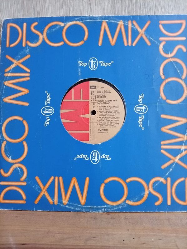 184) Disco LP ( SMOKIE ) Con sobre generico  " Bright Light and Back Alleys) Incluye Needles And Pins ) 1978 Industria Uruguaya