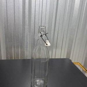 Botella de Vidrio Transparente con Cierre de Bisagra y Relieves Verticales - imagen 3