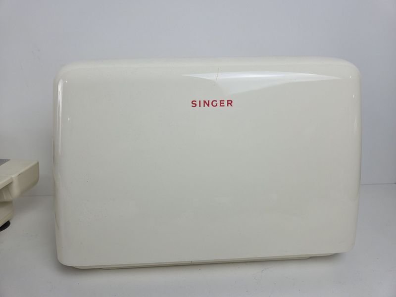 Completa máquina de coser Singer con manuales, mesa y accesorios - imagen 11