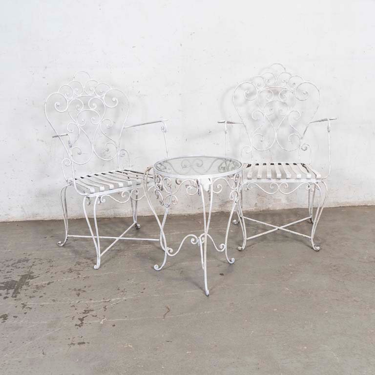 Lote anterior: Jardín de hierro con mesa y sillas