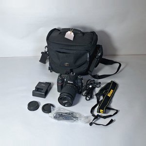 Lote anterior: Cámara Nikon D7100 con Lente 18-105mm, Cargador y Bolso Tamrac