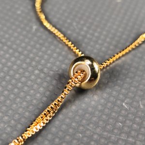 Cadena con Dije Artesanal en Plata y Pulsera Dorada con Piedras Sintéticas - imagen 8