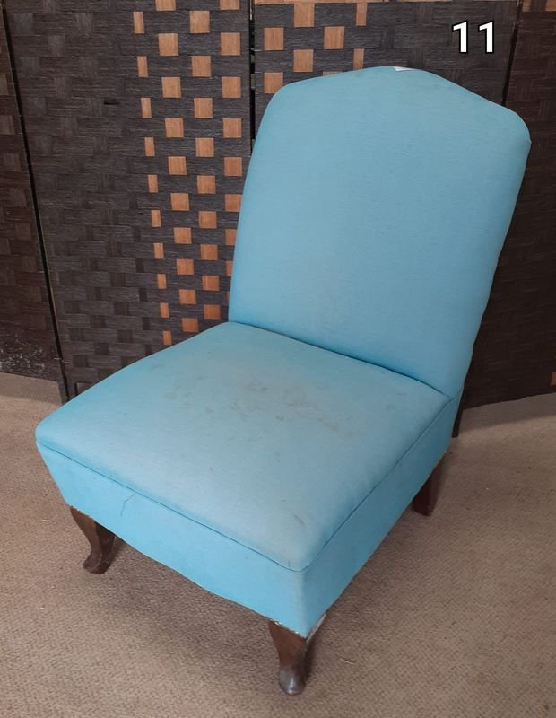 Sillon de un cuerpo tapizado en turquesa