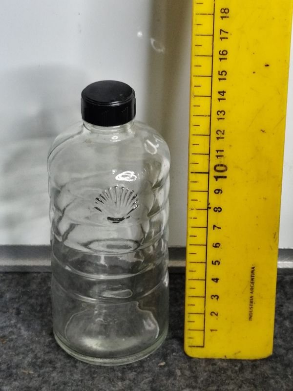 Botella Antigua de Vidrio Shell con Tapa Negra - imagen 1