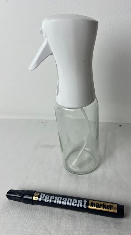 Botella aceitera de plástico con cuerpo transparente - imagen 2