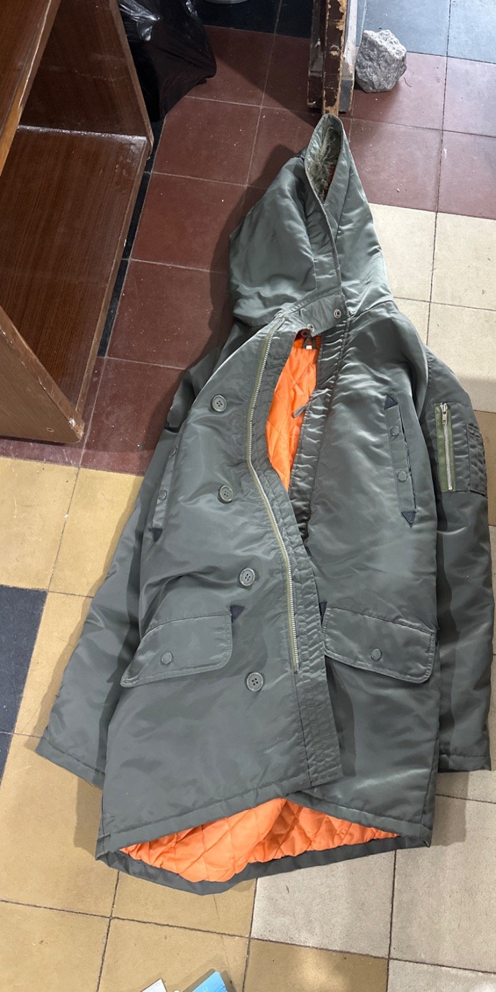 Campera verde con forro naranja