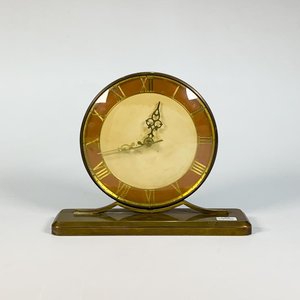 Lote siguiente: Reloj de sobremesa Art Deco en bronce con esfera de números romanos