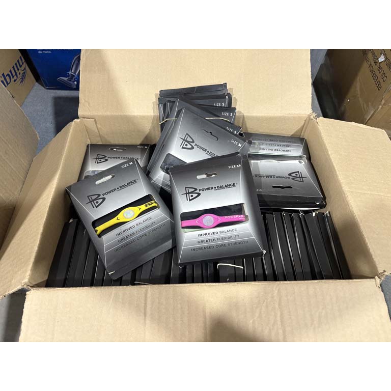 Lote siguiente: Pulseras Power Balance y caja de almacenamiento