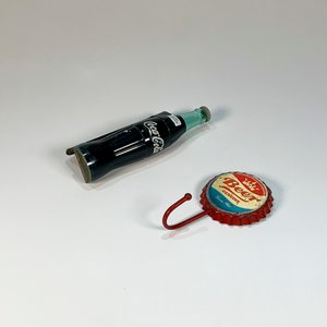 Lote siguiente: Manija Coca-Cola y Perchero Tapa de Cerveza Vintage