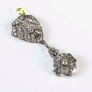 Lote siguiente: Prendedor de Plata con Reloj y Piedras