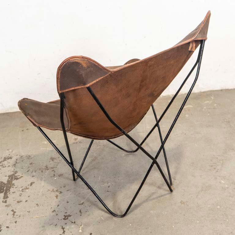Sillón africano tapizado en cuero con averías - imagen 3