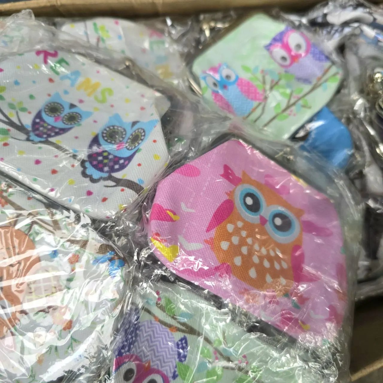 Lote siguiente: Monederos con diseño de búho
