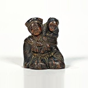 Lote siguiente: Escultura en Bronce: Anciano Oriental con Mono en el Hombro