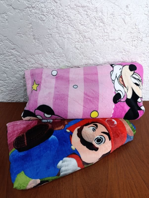 Lote siguiente: Frazadas de Mario y Minio para decorar tu hogar