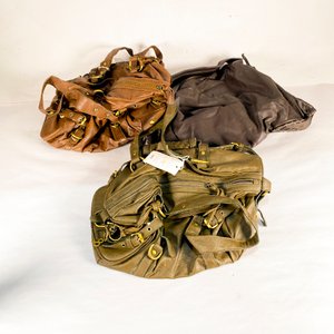 Lote anterior: Tres Carteras de Dama de Cuero Marrón y Ocre