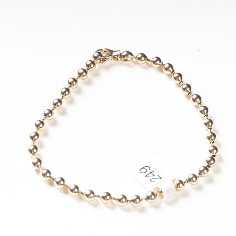 Lote siguiente: Pulsera de oro con bolitas