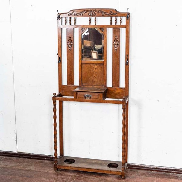 Recepción en roble con espejo biselado y detalles de madera - imagen 1