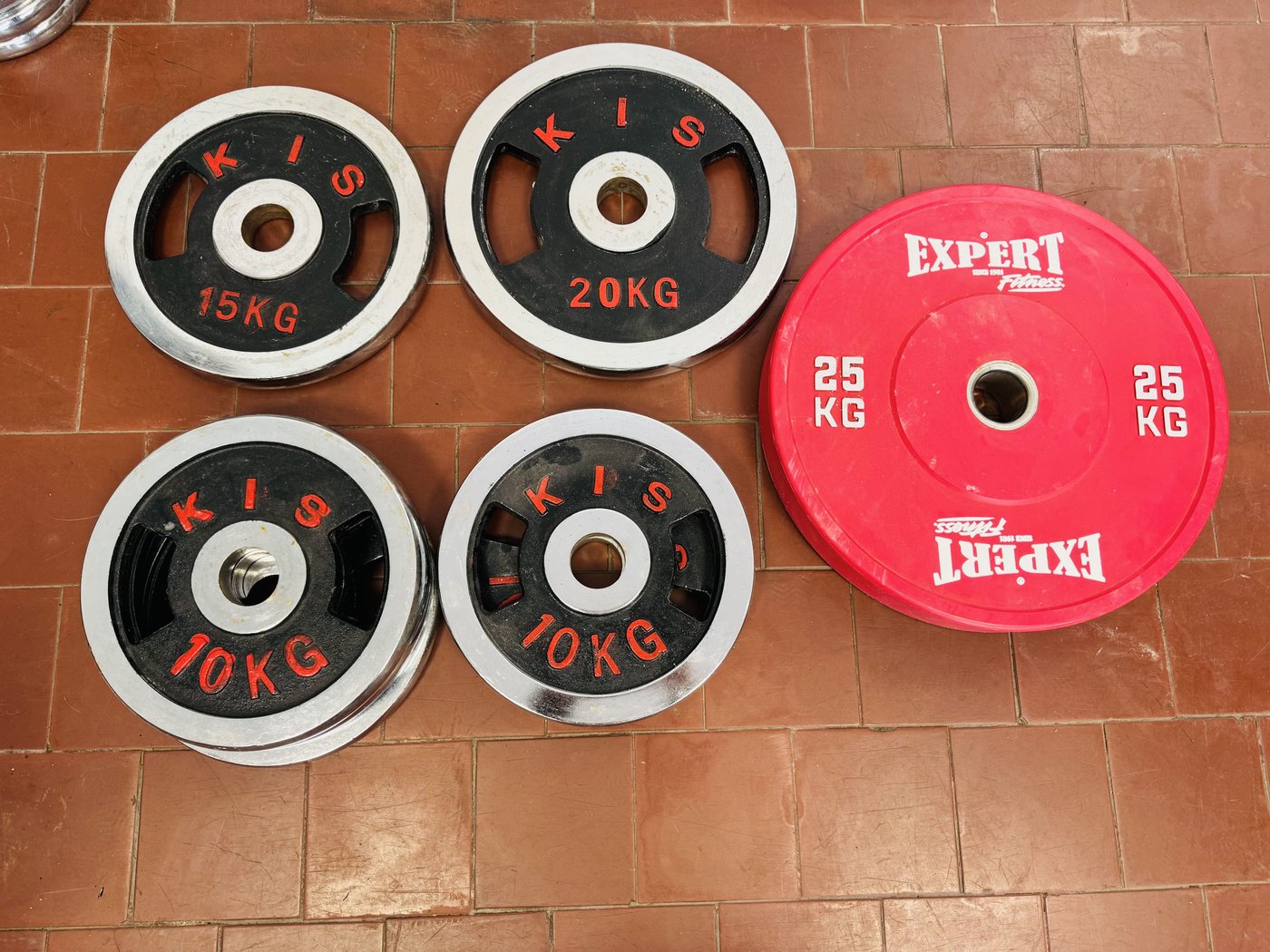 Discos Olímpicos de Pesas Kis y Expert: 5x10kg, 1x15kg, 1x20kg, 1x25kg
