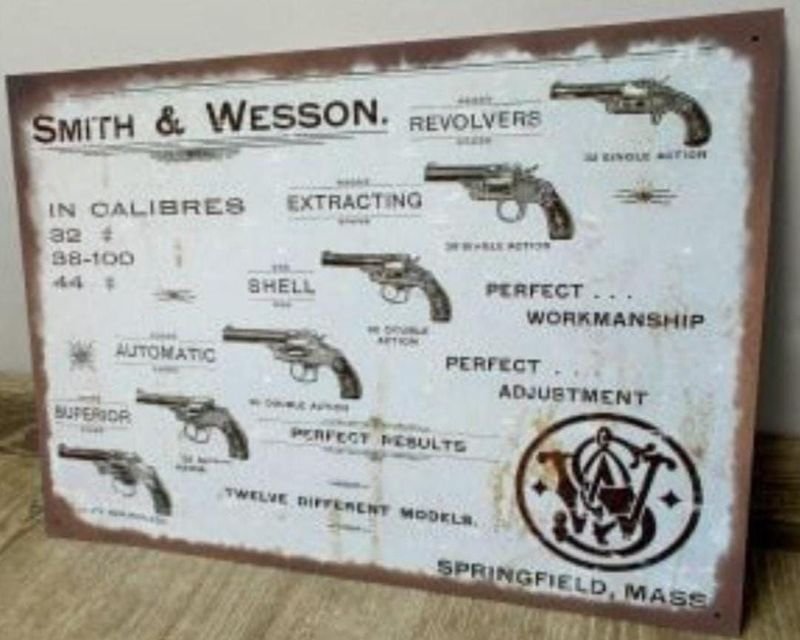 Lote anterior: Cartel decorativo de revólveres Smith & Wesson